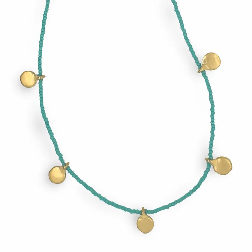 DOT NECKLACE IN GOLD ON TURQUOISE BEADS