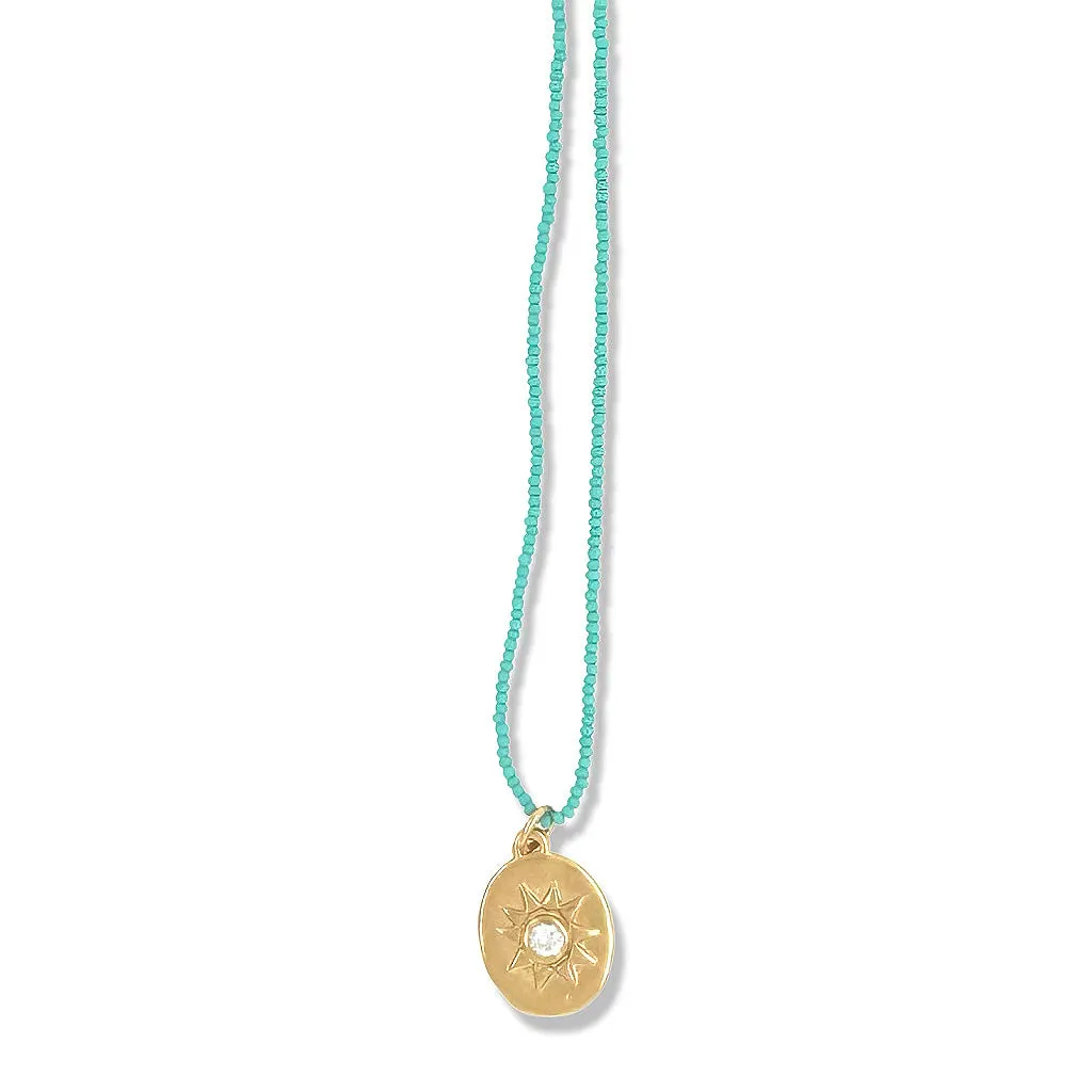 SELENA NECKLACE IN GOLD ON TURQUOISE BEADS